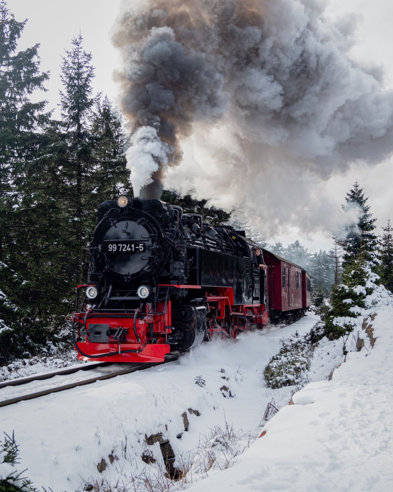 The "Brokenbahn" driving through a snowy landscape on its way to the Brocken top